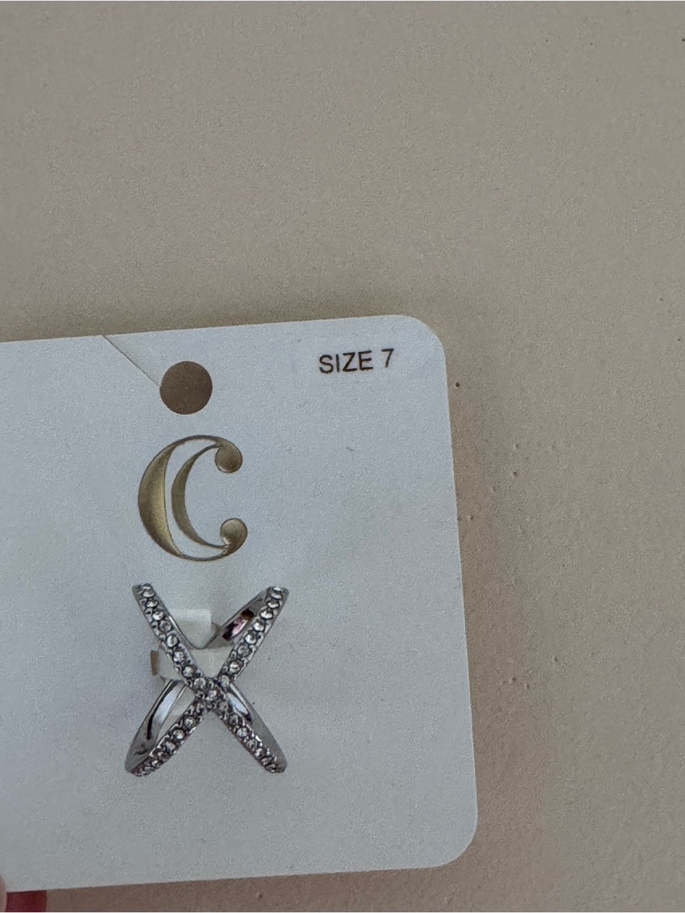 Charming Charlie Silver X Ring with Clear Rhinestones